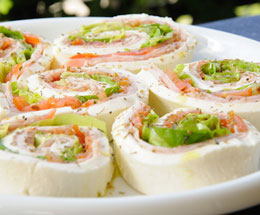 Rolled mozzarella with ham and vegetables