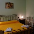 7. Camera Tripla Matrimoniale con culla su piscina (1)